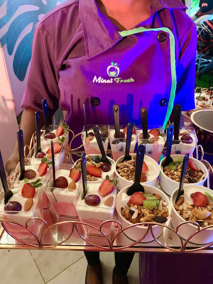 Elegant rose gold tray of parfait cups for event service